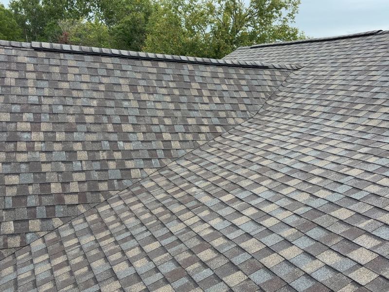 Finished shingle roof with skylight